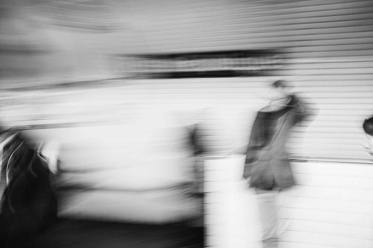 The blurred silhouette of a man on the subway platform in Paris, from the series Going Underground by Emmanuel Pineau